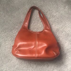 Small rust colored purse